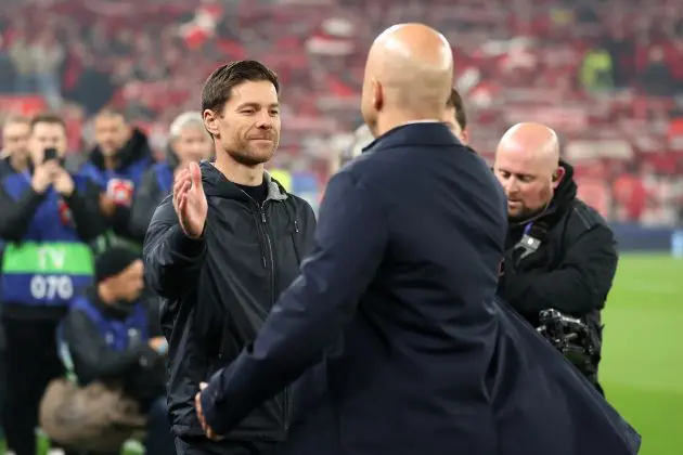 Xabi Alonso and Arne Slot greet one another