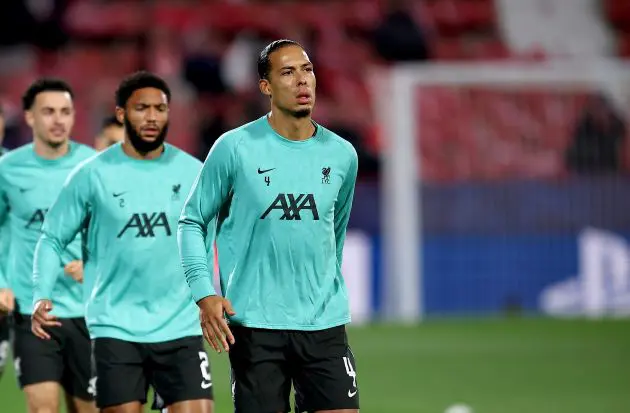 Virgil van Dijk warms up ahead of Liverpool v Girona.
