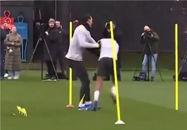 Virgil van Dijk and Rio Ngumoha enjoyed a light-hearted moment in Liverpool training
