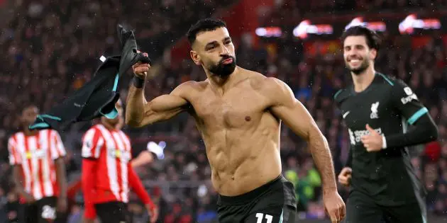 Mo Salah celebrates scoring against Southampton and takes his shirt off