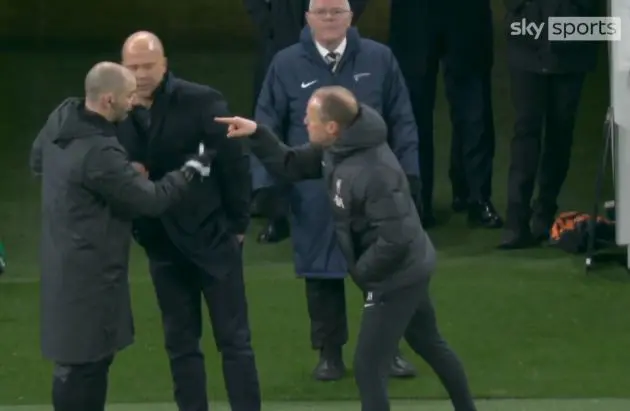 Arne Slot and Sipke Hulshoff argue with fourth official during Tottenham defeat.