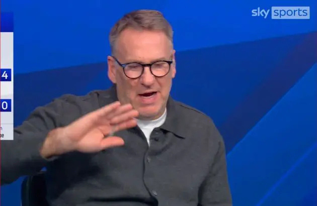 Paul Merson waves his hand during Sky Sports coverage.