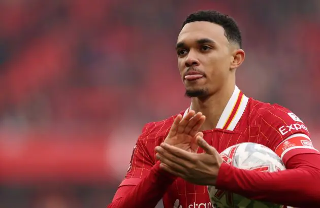 Trent Alexander-Arnold applauds Liverpool fans at Anfield.