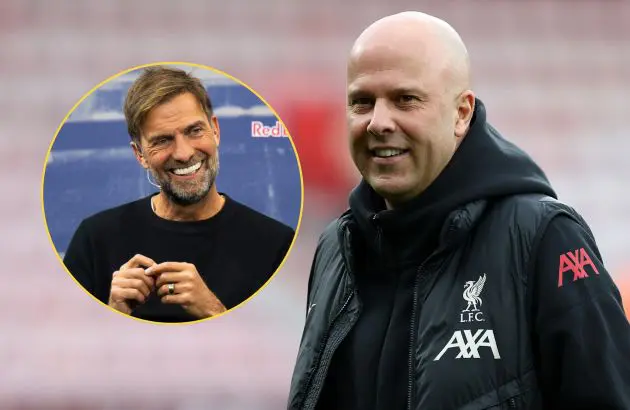 Jurgen Klopp looks at Liverpool head coach Arne Slot.