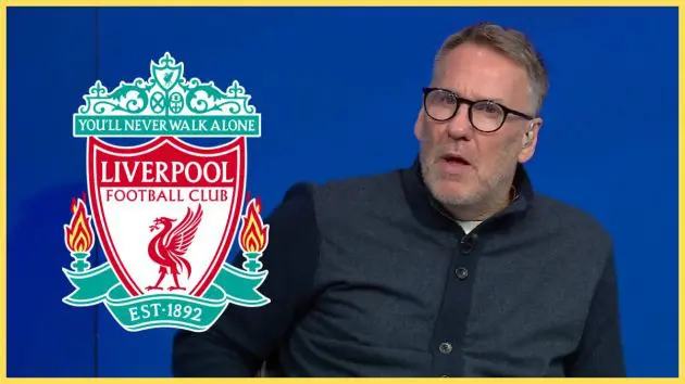 Paul Merson looks open-mouthed at Liverpool club crest.