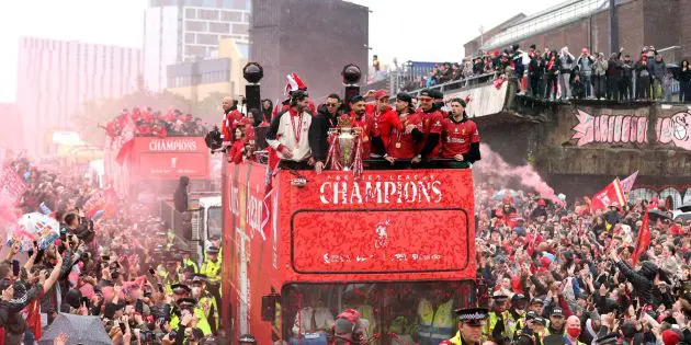 Liverpool players celebrate in the trophy parade