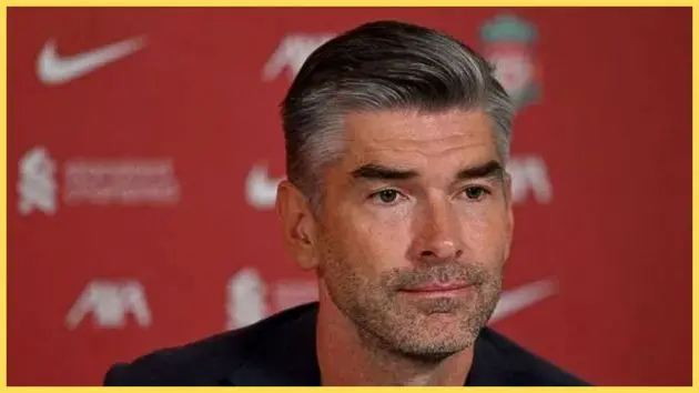 Richard Hughes looks on during Liverpool press conference.