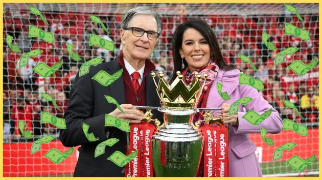 John Henry and Linda Pizzuti Henry pose with the Premier League trophy