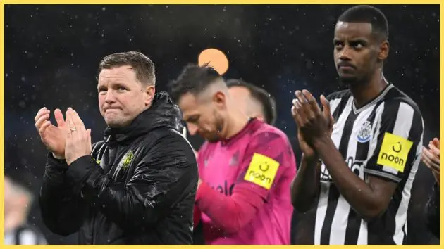 Eddie Howe and Alexander Isak clap their hands.