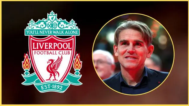 Christoph Freund looks on next to Liverpool club crest.