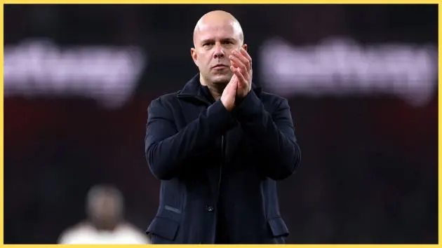 Arne Slot applauds the travelling Liverpool fans after the 0-0 draw at Arsenal