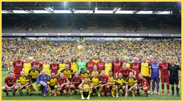 The teams stand for a mixed photo before the friendly game Borussia Dortmund Legends - FC Liverpool Legends during the session opening of the Borussia Dortmund on August 11, 2018 in Dortmund, Germany