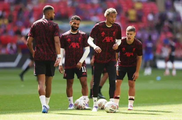 Mo Salah and Hugo Ekitike partake in warm-up drills prior to the Community Shield