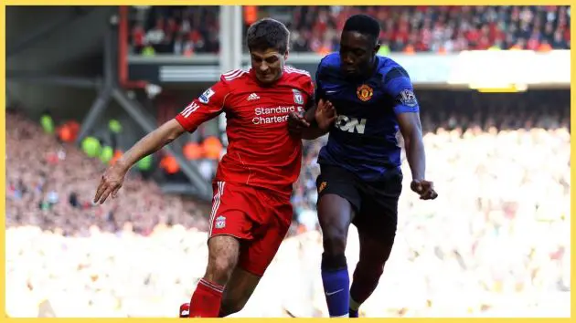Steven Gerrard of Liverpool competes with Danny Welbeck of Manchester United