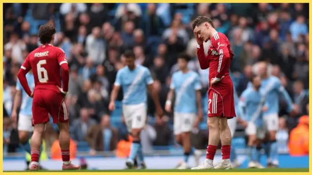 Florian Wirtz of Liverpool looks dejected after Erling Haaland of Manchester City (not pictured) scored the team's second goal during the Emirates FA Cup Quarter Final match between Manchester City and Liverpool at Etihad Stadium