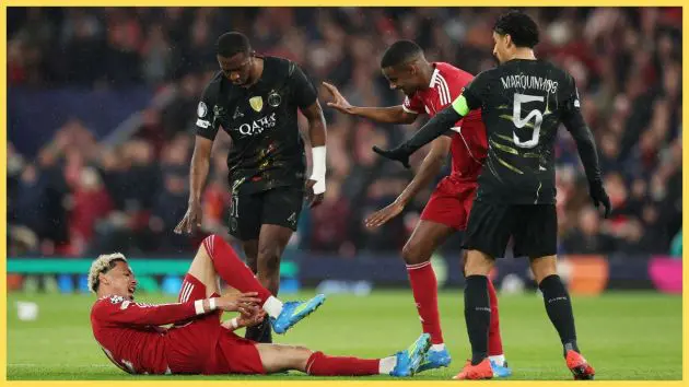 Hugo Ekitike of Liverpool holds his ankle as he appears to be injured during the UEFA Champions League 2025/26 Quarter-Final Second Leg match between Liverpool FC and Paris Saint-Germain FC at Anfield