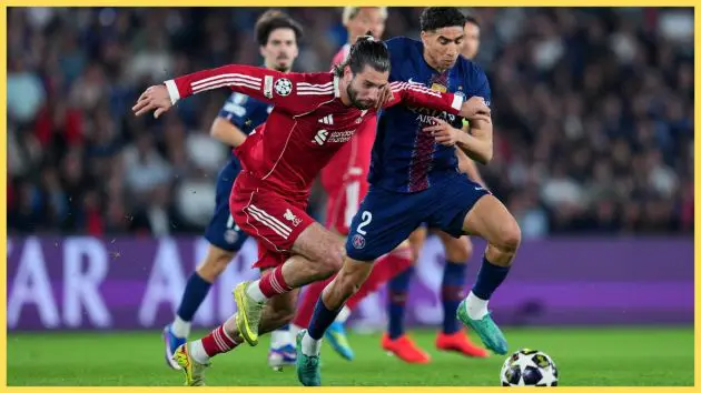 Dominik Szoboszlai of Liverpool battles for possession with Achraf Hakimi of Paris Saint-Germain during the UEFA Champions League 2025/26 Quarter-Final First Leg match between Paris Saint-Germain FC and Liverpool FC at Parc des Princes