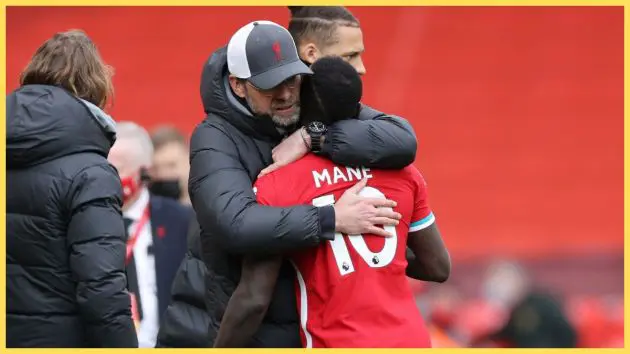 Jurgen Klopp, Manager of Liverpool embraces Sadio Mane following the Premier League match between Liverpool and Aston Villa at Anfield