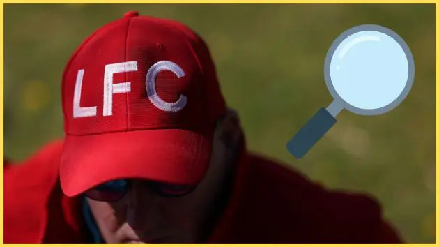 An image of a Liverpool supporter wearing an LFC cap