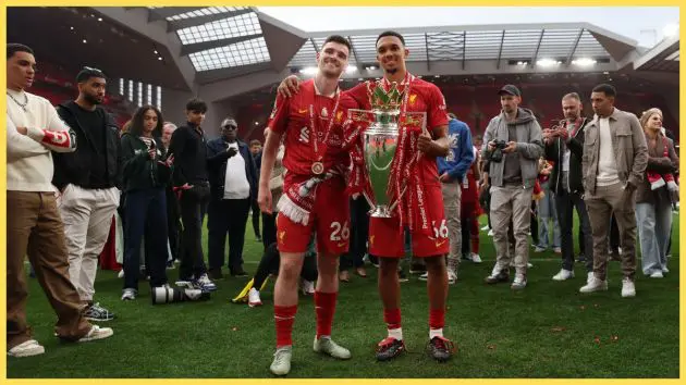 Andrew Robertson and Trent Alexander-Arnold of Liverpool pose for a photograph with the Premier League trophy, as Liverpool are crowned the Champions of the Premier League for the 2024/25 Season, following the Premier League match between Liverpool FC and Crystal Palace FC at Anfield