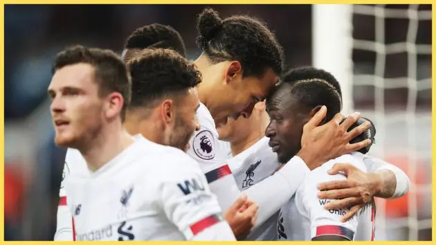 Sadio Mane of Liverpool celebrates with teammate Virgil van Dijk after scoring his team's second goal during the Premier League match between Aston Villa and Liverpool FC at Villa Park