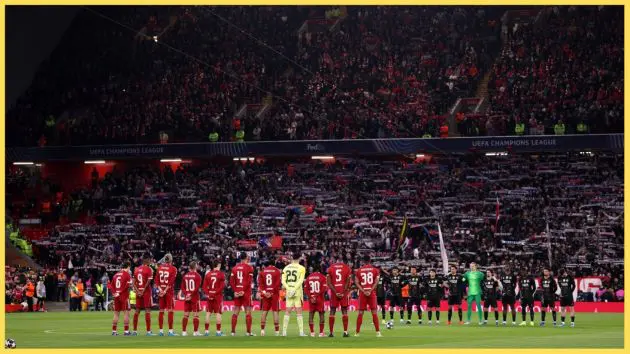 Liverpool players observe a minute's silence at Anfield