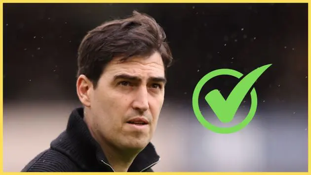 Incoming Liverpool manager Andoni Iraola looks on next to green checkmark.