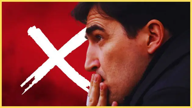 Liverpool manager Andoni Iraola puts his hand over his mouth.