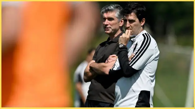 Richard Hughes and Andoni Iraola watch a Liverpool training session