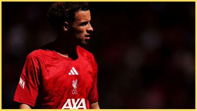 Curtis Jones pictured during the warm-up for a Liverpool game at Anfield
