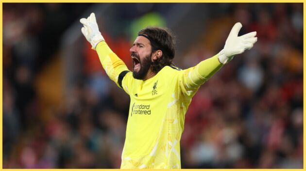 Alisson Becker shouts instructions to his teammates